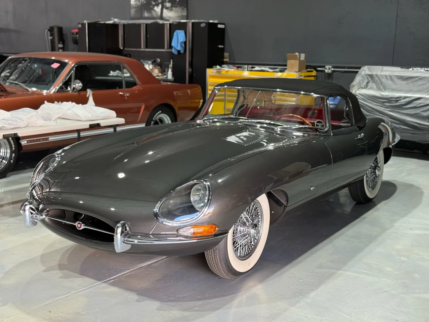 Grey Jaguar E-Type with wire wheels restored at Artec Automotive in Belmont, CA